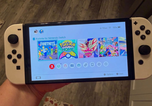Nintendo Switch oled with 37 games and accessories